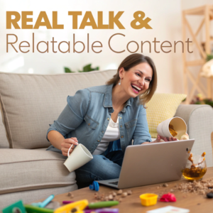 A smiling mother sitting on the couch, accidentally spilling her coffee while working on a laptop, surrounded by toys and a cheerful atmosphere.